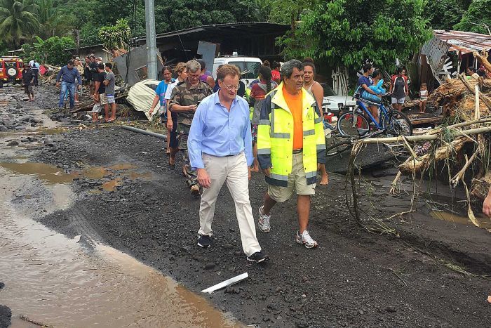 Residents evacuated, airport closed and power cut off in Tahiti flooding